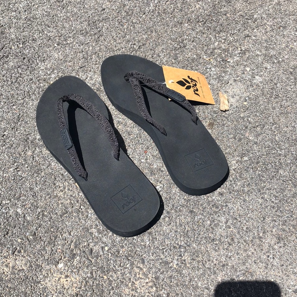 Black reef flip flops